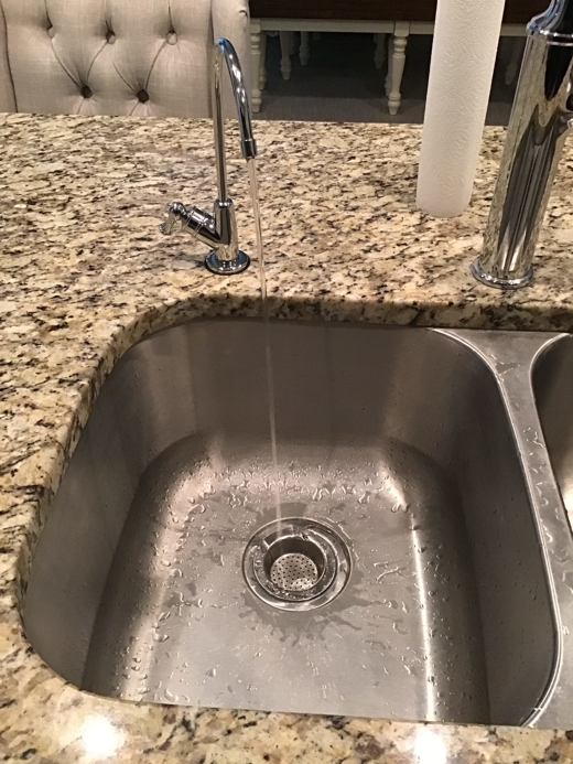 Water filter attached to kitchen sink 