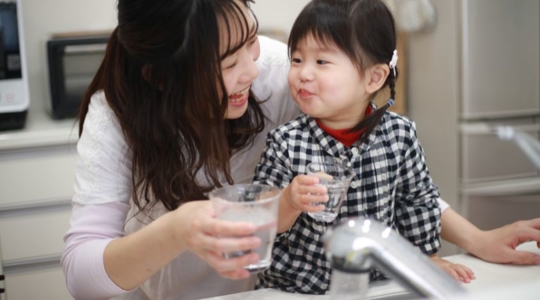 family drinking clean tap water