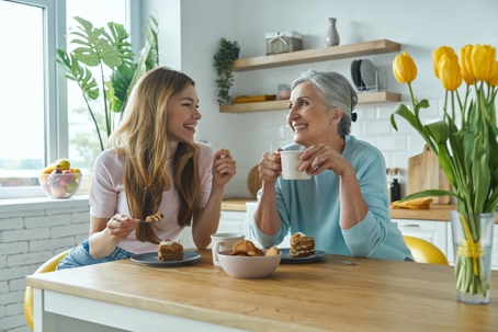 two women comfortable talking at home