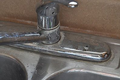 Hard water buildup on faucet